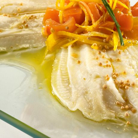 Filetti di platessa con pomodori all'arancia Filetti di platessa con pomodori all'arancia